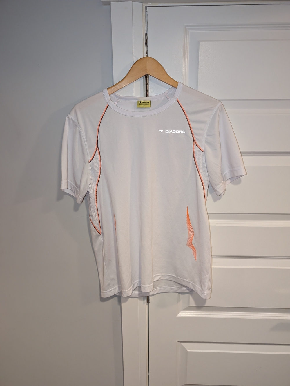 Diadora White Short Sleeve Athletic Top with Orange Accents